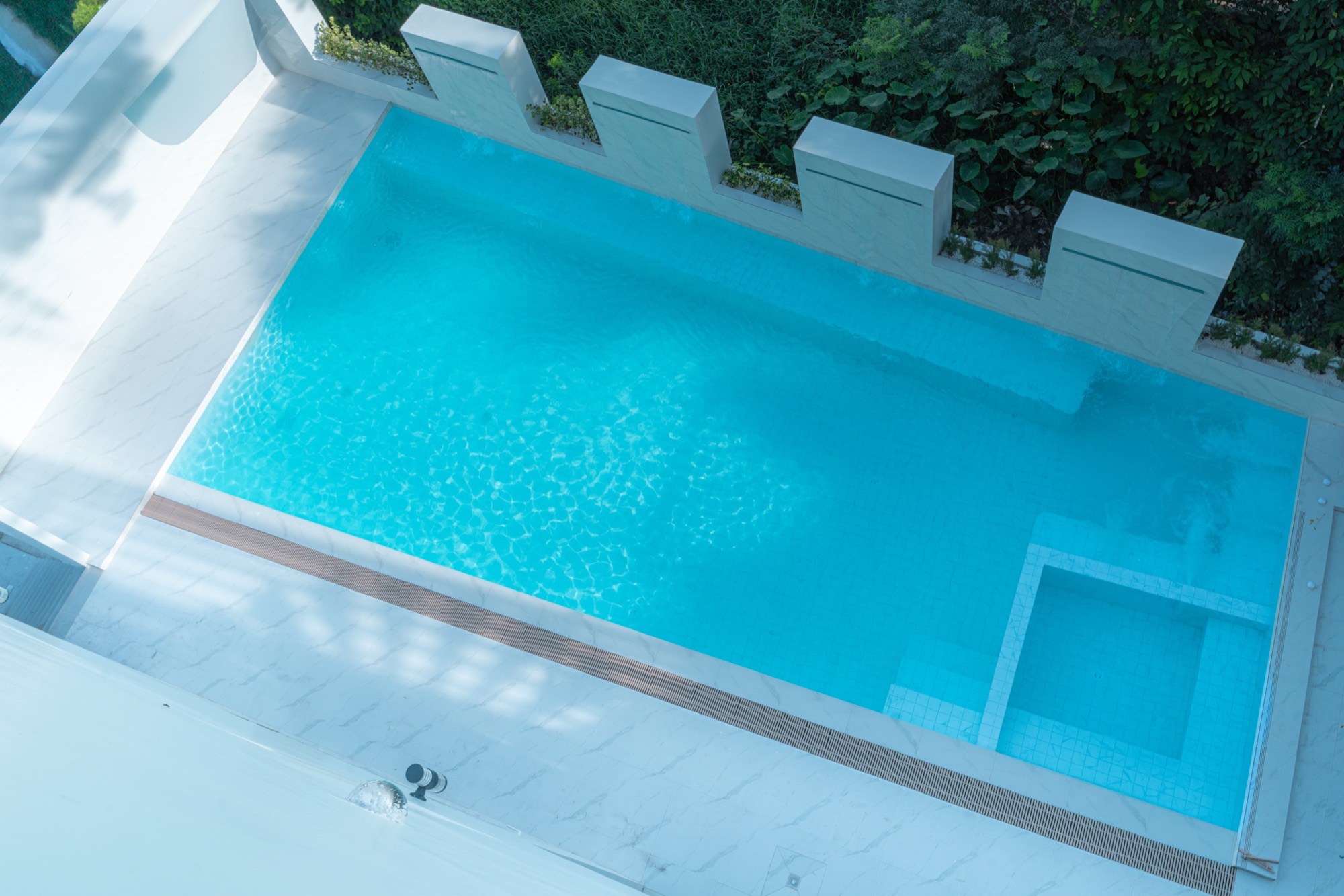 Resort-style pool and grounds at Chansiri Residence